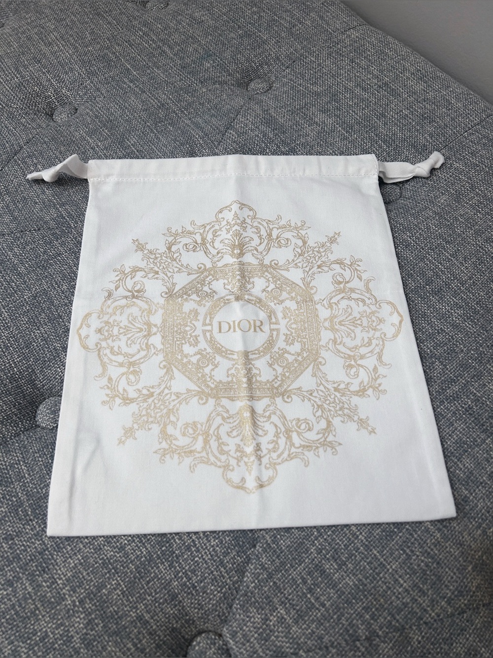 Dior White Drawstring Cosmetics Pouch with Gold Crest Motif